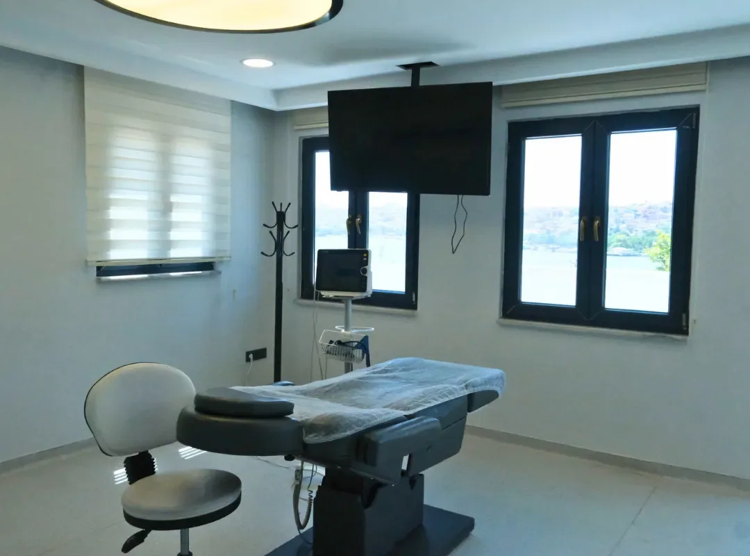 Treatment room at the medical centre with treatment chair and patient monitor